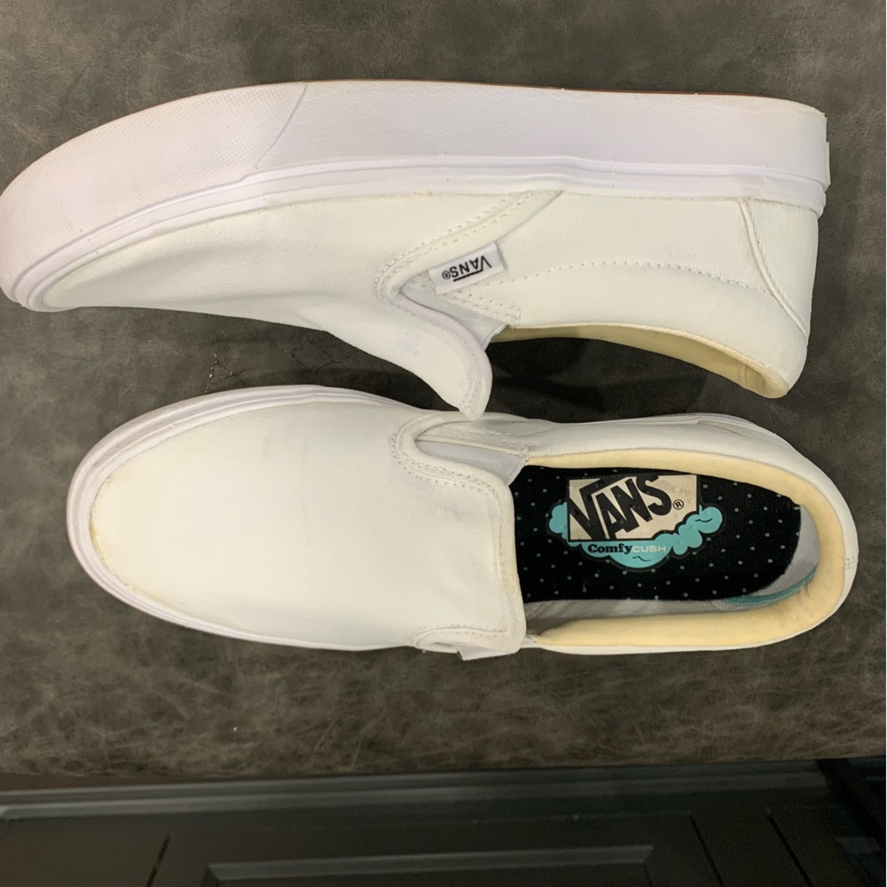 Unisex Vans ComfyCush white canvas slip on shoes.